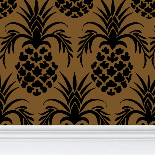 Black pineapple colonial stencil on dark gold background